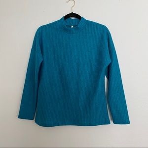 High neck blue sweater